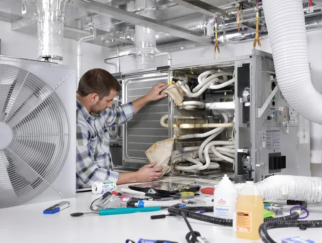 Winthrop Air Duct Cleaning specialist performing precision AC coil cleaning in Winthrop