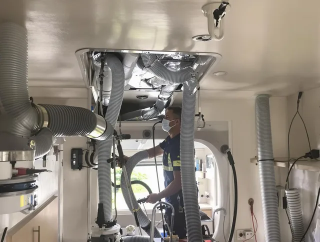 Winthrop Air Duct Cleaning specialist performing precise mobile home duct cleaning in Winthrop