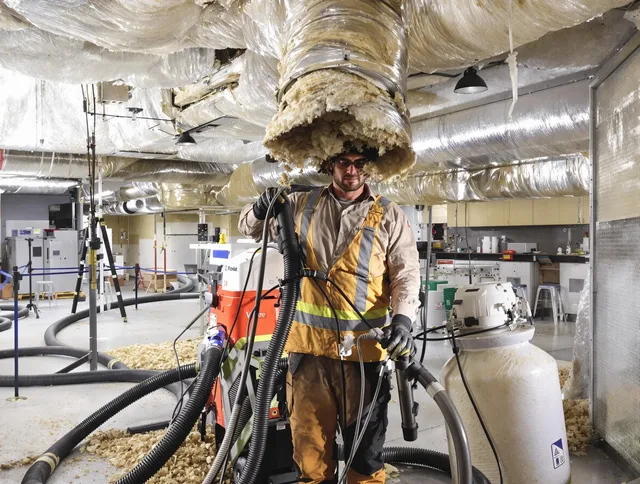 Professional vacuum insulation removal by Winthrop Air Duct Cleaning expert in Winthrop